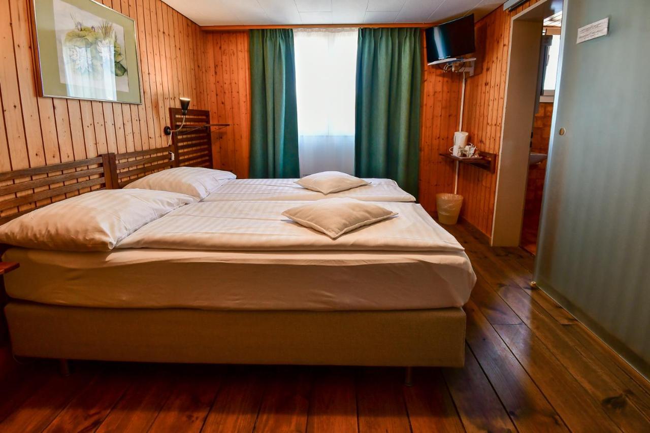 Hotel Tell And Apartments Unterseen Ngoại thất bức ảnh